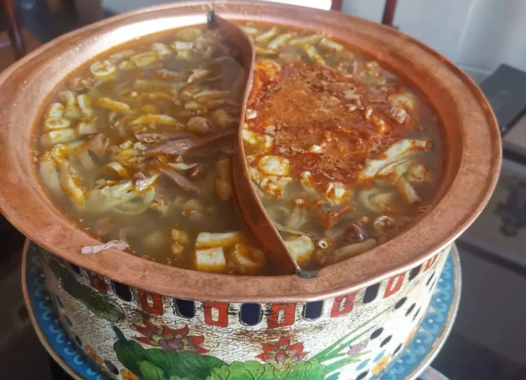 DƬ